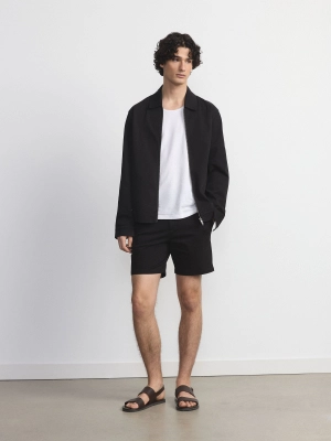 The Slim Flex Short in Black